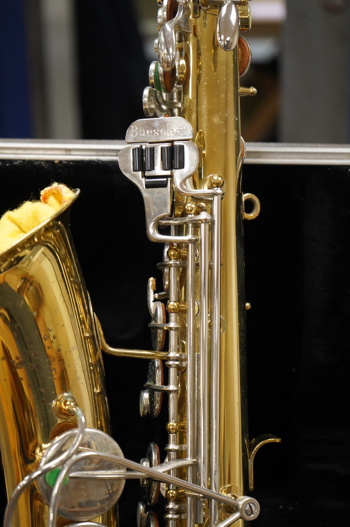 A cased Buesohner Aristocrat alto saxophone